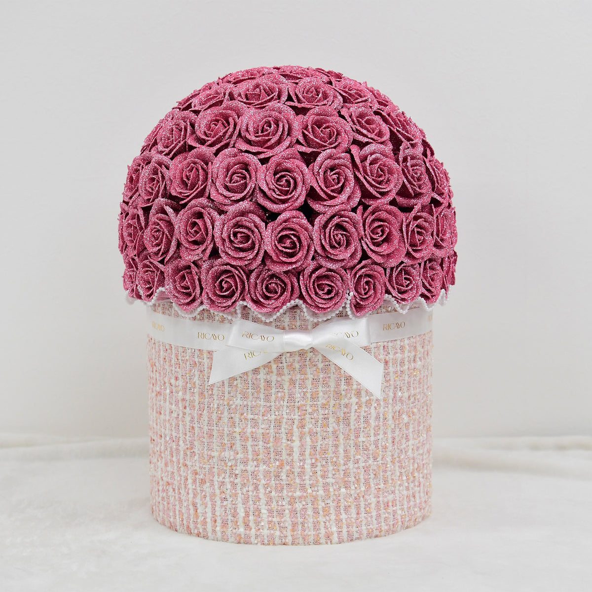 KOHANA 100 pink glitter roses with ivory jewelry tweed bowl bouquet by RICAYO