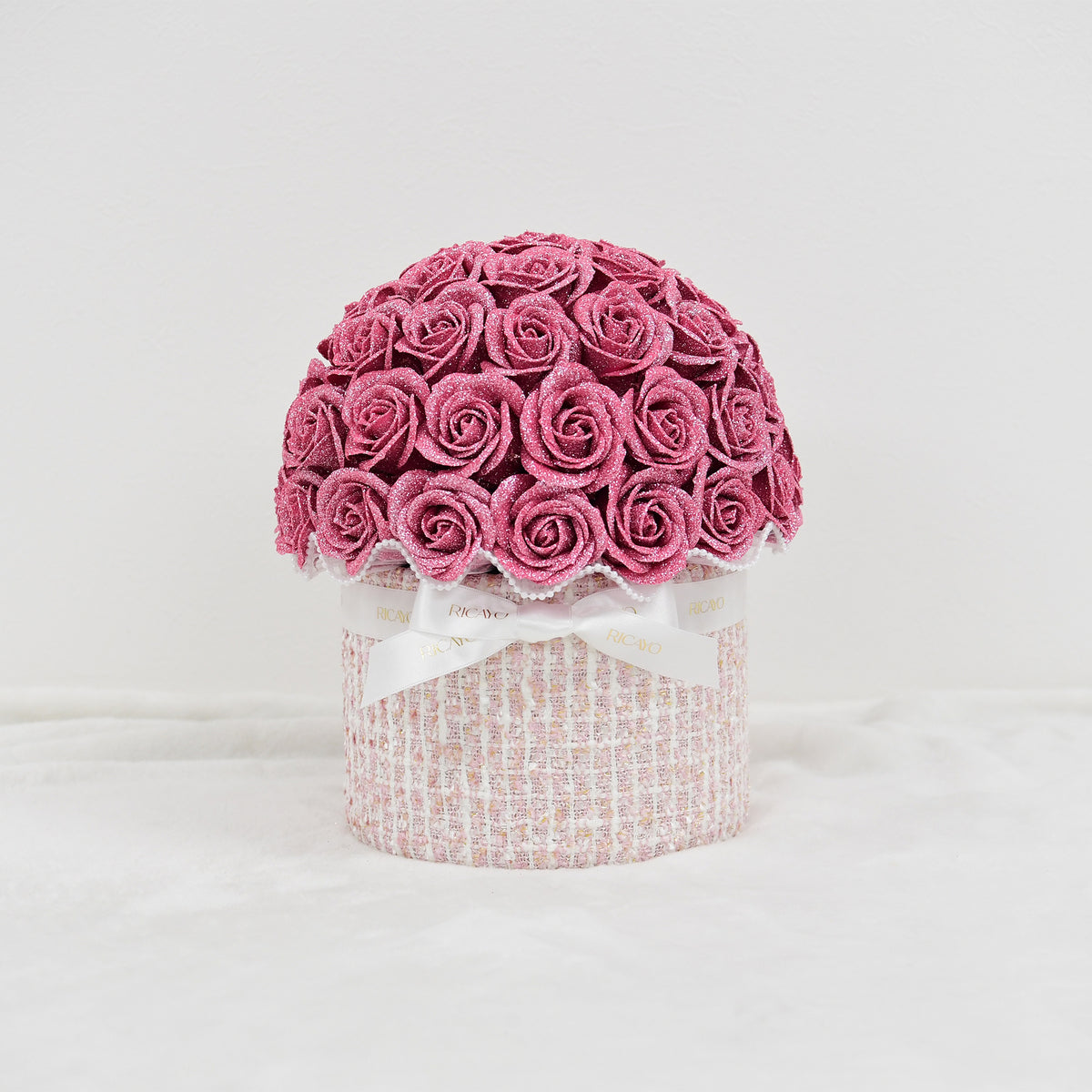 KOHANA 50 pink glitter roses with ivory jewelry tweed bowl bouquet by RICAYO